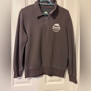 NWOT Women’s Roots mauve quarter zip sweater in size medium.